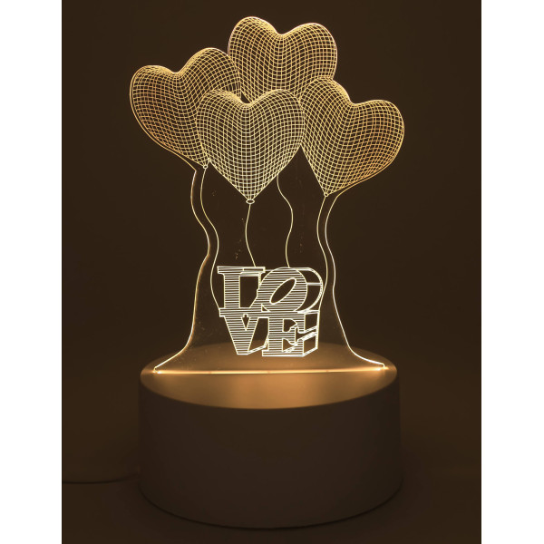 Veilleuse LED Love allumée, lumière chaude et faible consommation pour une atmosphère romantique