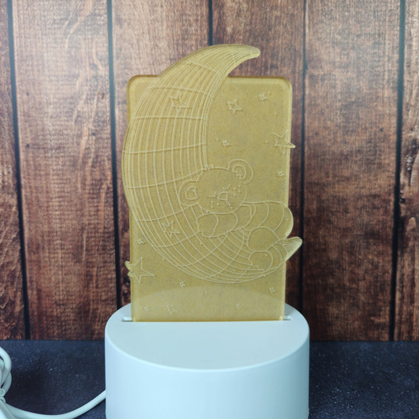 Veilleuse LED lune USB au design doux, idéale pour créer une ambiance apaisante dans une chambre d’enfant ou de bébé