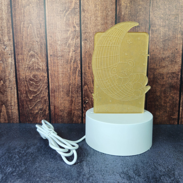 Vue d’ensemble de la veilleuse lune avec socle blanc et câble USB, parfaite comme lampe de chevet rassurante