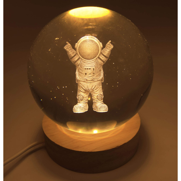 Veilleuse LED astronaute créant une atmosphère relaxante, idéale pour la chambre