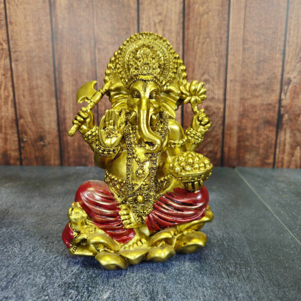 Statue Ganesh dorée assise sur lotus – statuette hindoue de protection et prospérité pour autel ou décoration spirituelle