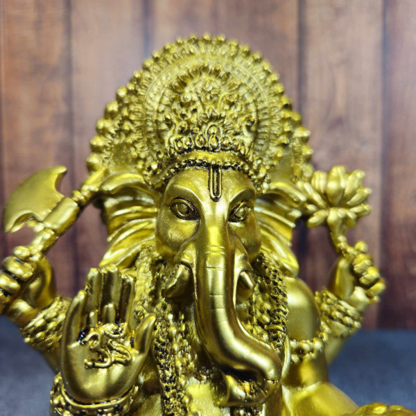 Visage statue Ganesh dorée – divinité hindoue symbole de sagesse, prospérité et réussite
