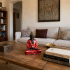 statue bouddha thai décoration salon table basse ambiance zen maison cocooning