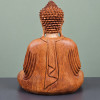 Bouddha en méditation en bois de suar vu de dos, avec coiffure en relief et plis du vêtement sculptés