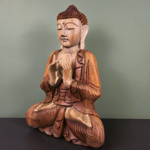 Bouddha de la transmission en bois de suar sculpté à la main, 60 cm, vu de trois-quarts, visage vers la gauche