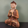 Bouddha de la transmission en bois de suar sculpté à la main, 60 cm, vu de trois-quarts, visage vers la gauche