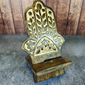 Support téléphone bois sculpté - Symbole Hamsa protecteur