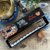 Coffret Tribal Soul Tarot Reading au design tribal, avec plume symbolisant le rituel de fumigation