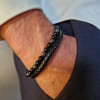 Bracelet artisanal homme en cuir tressé avec Onyx et Hématite – sérénité, force intérieure et raffinement